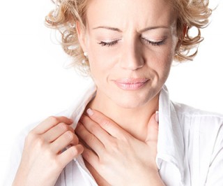 Woman with heartburn