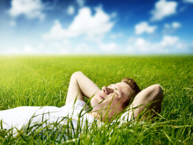 A man lying in the grass